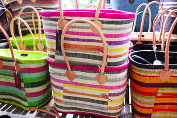 set of handmade woven straw baskets at the market