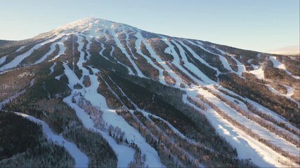 Evening light behind the mountain of Sugarloaf in Maine.