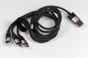 Coiled cable adapter USB Type-A to three various plugs