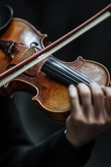 Close-up of Violinist's Hand Playing Violin with Bow