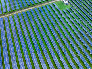 Aerial view of solar farm. Sustainable renewable energy and modern photovoltaic technology for eco-friendly electricity production. Solar power station. Green energy solutions. Solar panel technology.