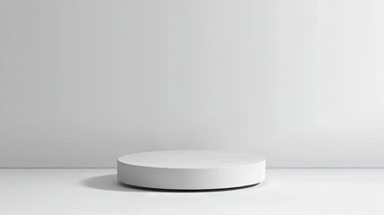 A round pedestal with a solid light grey background, perfect for clean and modern product presentations.