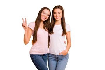 Close up photo two cheerful people beautiful she her ladies models hand arm fingers show v-sign say hi relatives friends hug cuddle embrace wear white pink casual t-shirts isolated yellow background