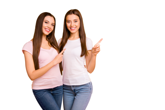 Close up photo two people beautiful she her ladies models best buddies hand arm fingers indicate direct empty space cool offer black friday wear white pink casual t-shirts isolated yellow background