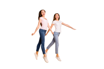 Full length body size view portrait of nice charming lovely attractive cheerful cheery straight-haired ladies strolling free time isolated over bright vivid shine yellow background