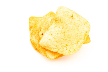A small stack of light orange, crispy fish crackers (kerupuk ikan) or shrimp crackers (kerupuk udang) on a white surface. A popular Indonesian snack.