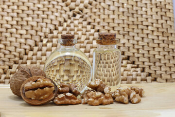 still life with a bottle walnuts oil and walnuts