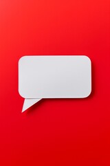 Naklejka premium A white paper with a red background and a speech bubble on it