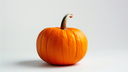 Orange pumpkin on a white background, minimalist style