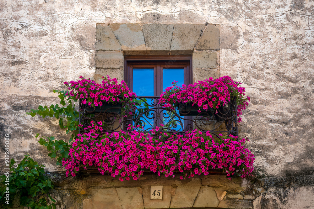 Wall mural window of an old house in the old quarter of sigüenza, guadalajara, castilla la mancha, spain, with 