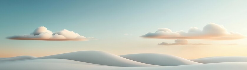 Soft, delicate grass swaying in the breeze under a blue sky with wispy clouds.