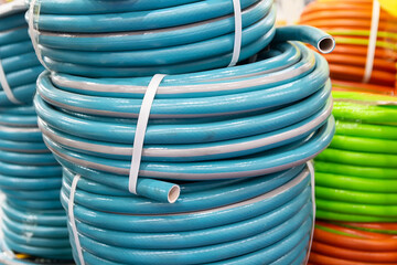 Coils with multi-colored rubber hoses on a store window