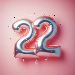 balloon in a shape of number 22 on pink background for birthday celebration