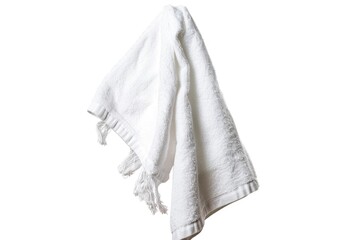 Fototapeta premium A single white towel hangs from a hook on the wall, ready for use