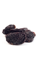 Dried prunes on a white background. Dried fruits.