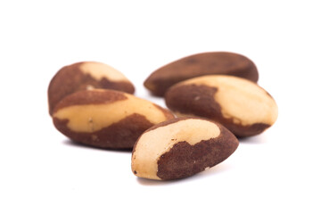 Brazil nuts over white background. Top view. Healthy food concept.