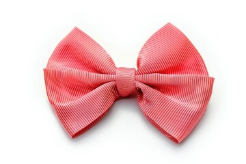 A pink bow on a white surface