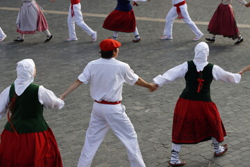 Basque folk dance performance in an outdoor festival