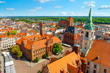 Aerial panoramic view of historical buildings and roofs in Polish medieval town Torun