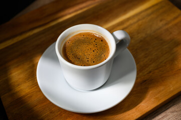 Food background with cup of coffee on wooden table