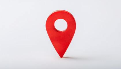 Fototapeta premium Red location marker isolated on white background. Navigational search. Close-up.