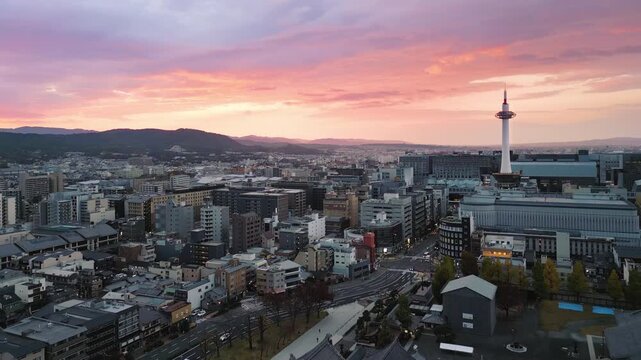 kyoto city aerial shot drone at sunrise,view of the train station area and kyoto tower