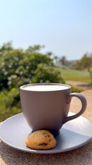  Savoring stylish coffee and tasty delectable cookie amidst greenery of park, capturing essence of peaceful and rejuvenating coffee break in nature. Perfect escape from daily grind. Urban Oasis
