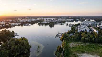 drone aerial view over Spandau Berlin in Germany over river HAvel on a sunny summer evening with sunset