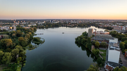 drone aerial view over Spandau Berlin in Germany over river HAvel on a sunny summer evening with...
