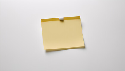  A clean and professional photo of a blank paper message note on a white background, secured with adhesive tape, ideal for office or business reminders.