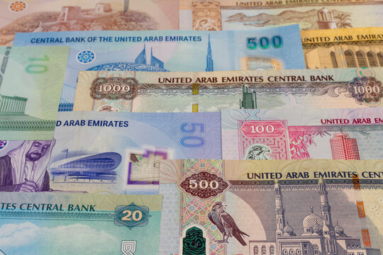 United Arab Emirates banknotes background. Selective focus.