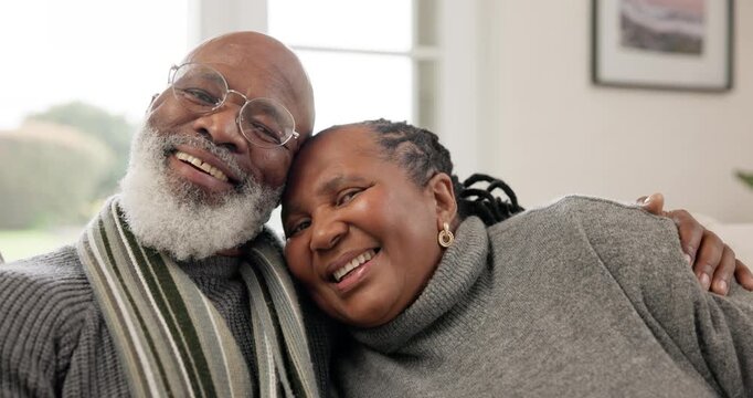 Face, happy senior black couple and love in home with care, loyalty and commitment to marriage in living room. Portrait, elderly man and woman hug with trust, support and smile to relax in retirement