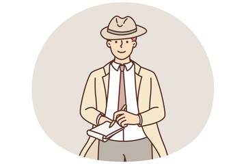 Male detective make notes in notebook