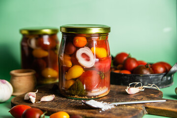Pickled cherry tomatoes in a jar
