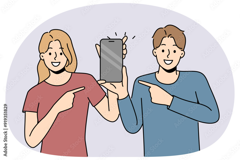 Aufkleber smiling couple point at cellphone with empty screen. happy man and woman point with finger on smartp