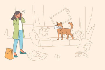 Unmannered dog that has robbed apartment stands on torn sofa near disappointed woman guardian
