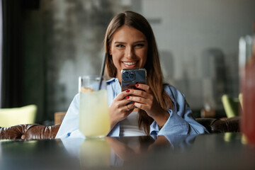Young beautiful woman is in the restaurant