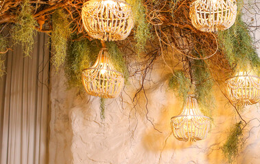 Beaded chandeliers on the ceiling like a garland. New Year . Style and modern design for the holidays
