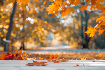 Empty table top and blurred autumn trees and colorful leaf background for display or montage your products