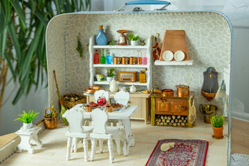 retro-style miniature dollhouse scale kitchen roombox with handcrafted furniture, dishes and utensils, miniature enthusiasts