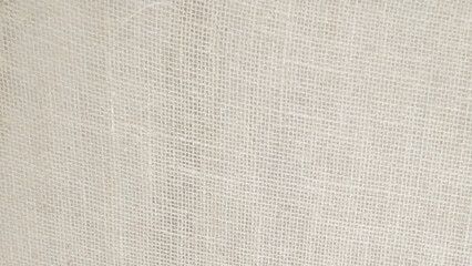 Close up beige table cloth fabric texture wallpaper. jute texture background, beige ivory backdrop