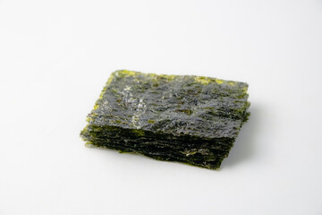 dried nori seaweed sheets, isolated on white background