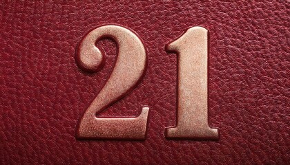 Metallic Embossed Number 21 on Leather Background