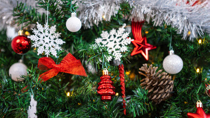 The lush fir tree branches come to life with the addition of Xmas elements.