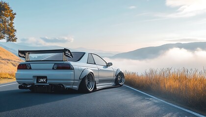 Fototapeta premium White Sports Car on a Mountain Road