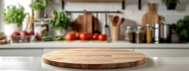 Empty wooden round pizza board on the kitchen table with a blurred background,mockup for a product display presentation design.