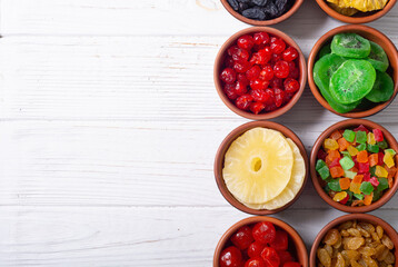 Group of dried and candied fruit in bowl