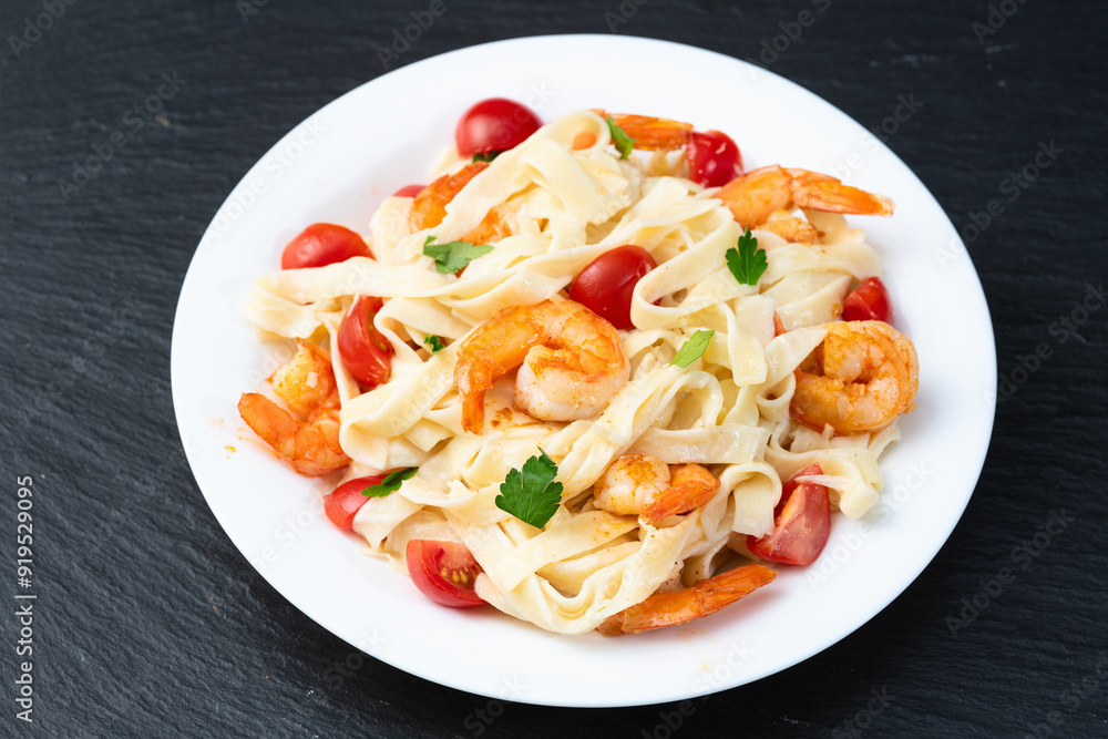 Canvas Prints italian pasta with shrimps , parmesan and tomatoes