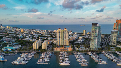 Luxury boat harbor. Marina in Miami Beach, Florida USA. Yacht boat docked on sea Biscayne bay....