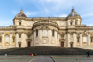 Fototapeta premium Rome, Italy - April 11, 2024: Rome, Italy - April 11, 2024: views of the streets of Rome, Santa Maria della Neve church, with tourists walking through its streets in Rome, Italy
